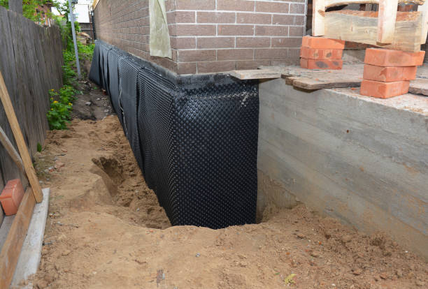 Happy homeowners after waterproofing job in Roslyn